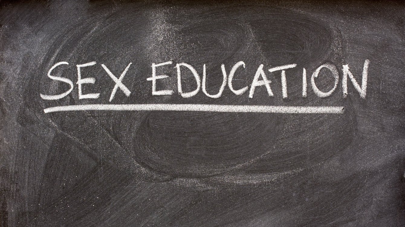 Chalkboard with text that reads "Sex Education"