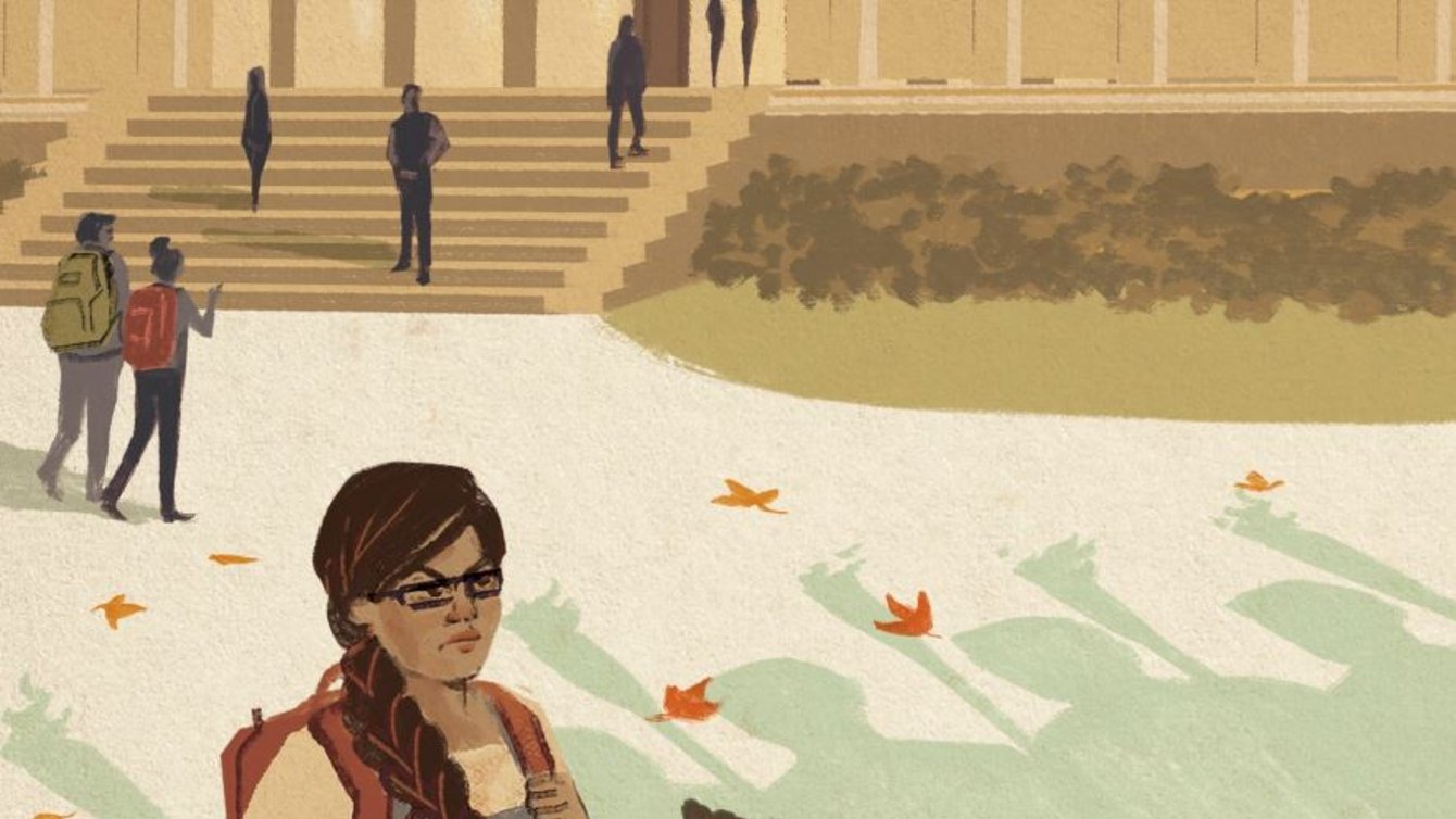 A student looks at the remaining boots of a toppled statue.