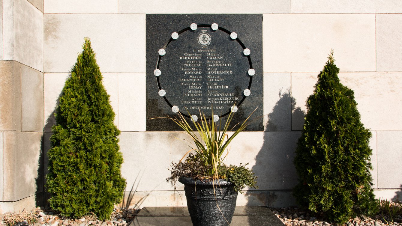 Plaque on the exterior wall of École Polytechnique commemorating the victims of the massacre. (Photo: Josie Desmarais)