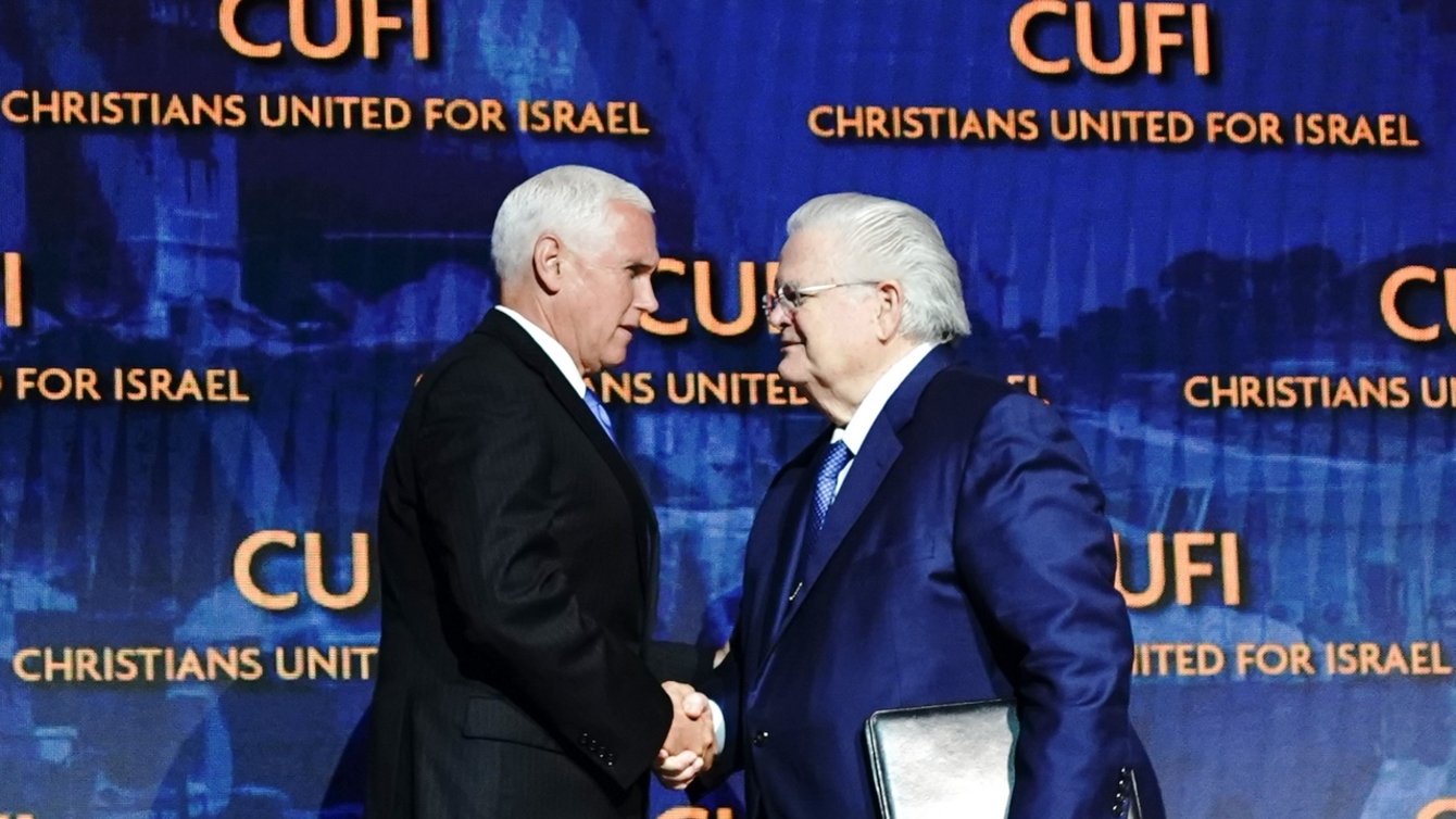 Vice President Mike Pence shakes John Hagee's hand and delivers remarks at the Christians United for Israel Washington Summit in Washington, D.C. Monday, July 8, 2019. (Official White House Photo/Flickr)