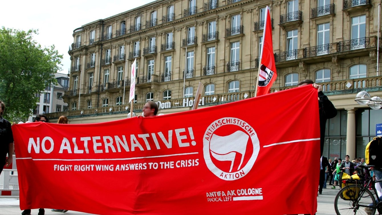 A red banner that reads "No Alternative! Fight Right Wing Answers to the Crisis"