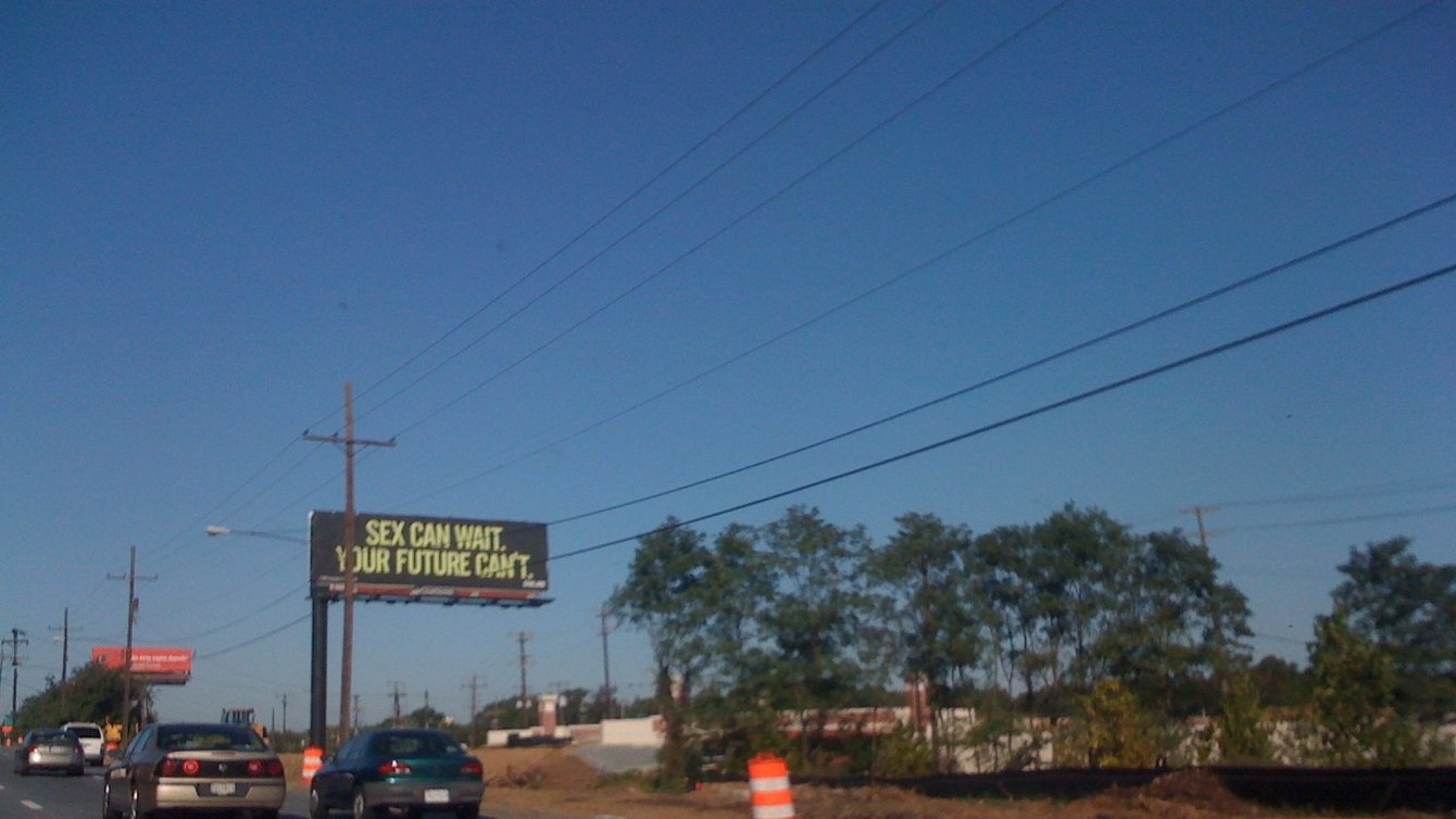 A sign board that says "Sex can wait. Your Future Can't"