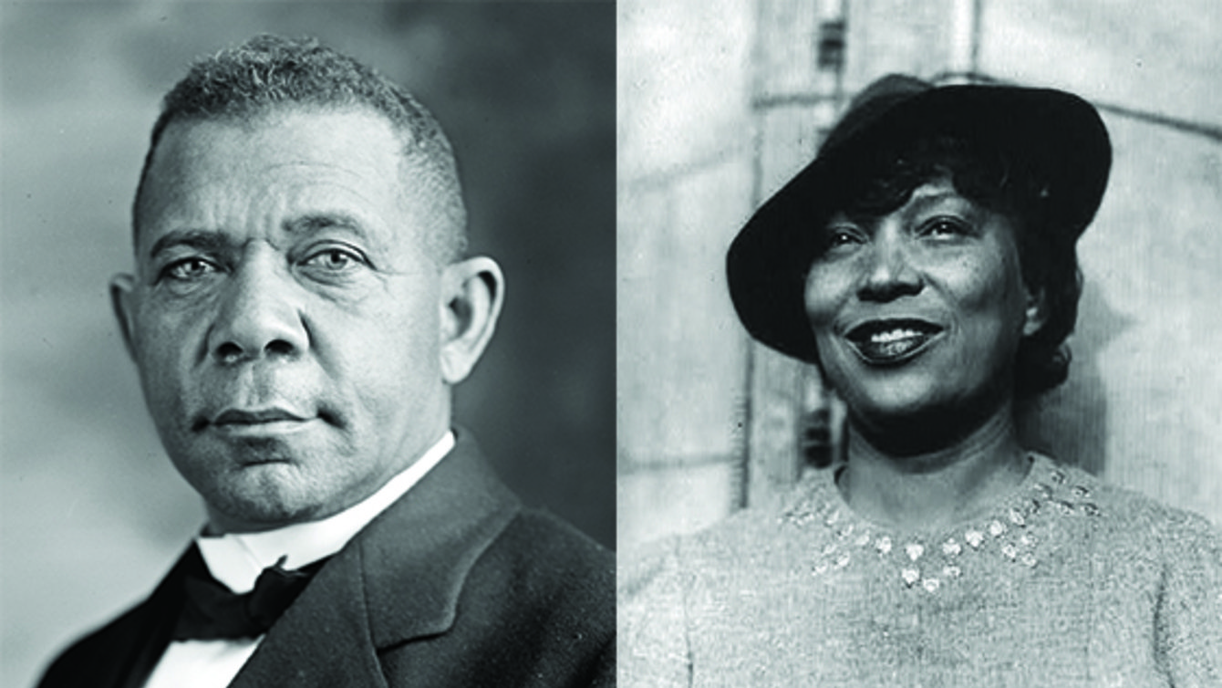 A Black man in a suit, and a Black woman in a dress and a hat