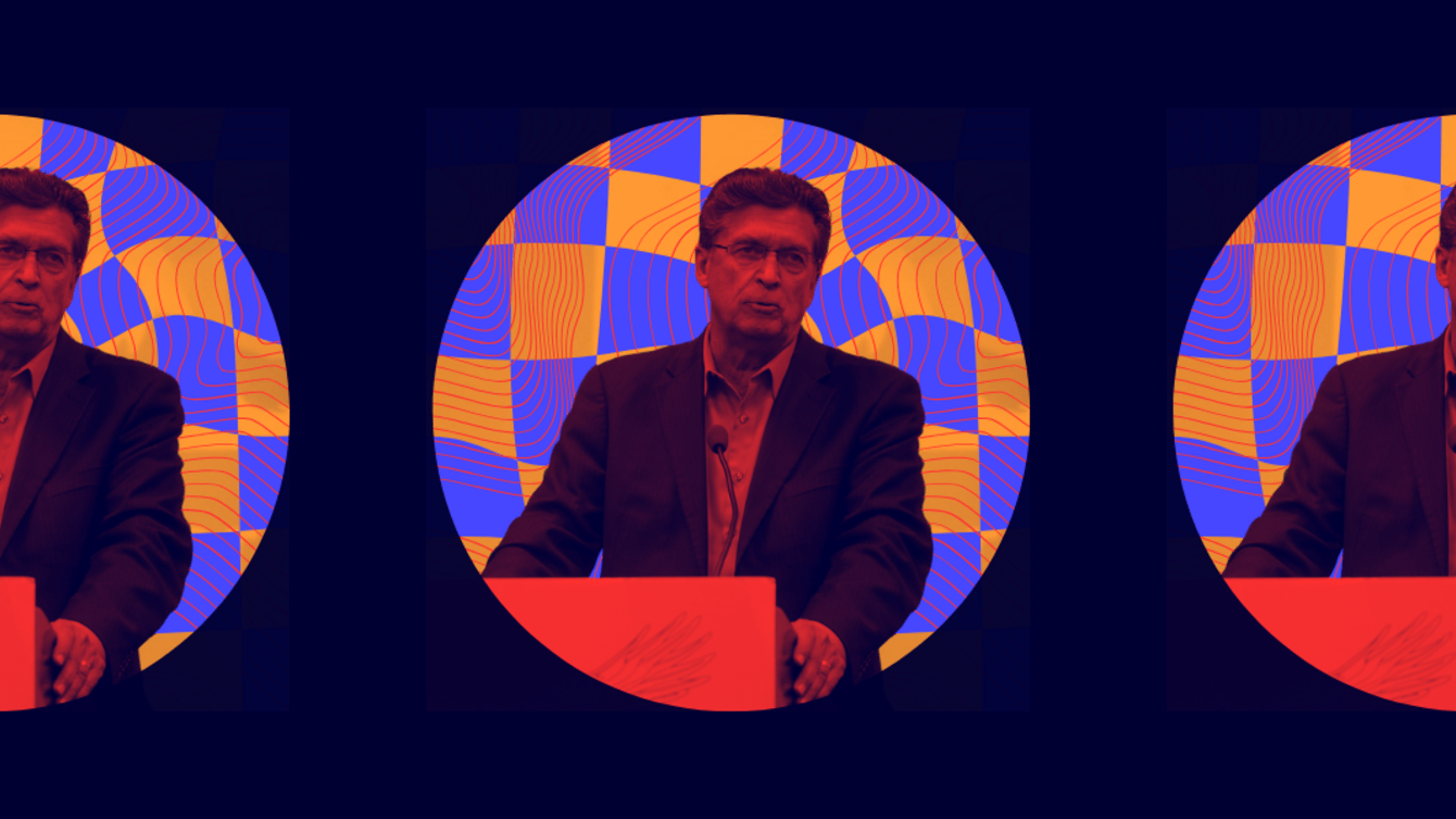 Former Sheriff Richard Mack speaks at a podium 