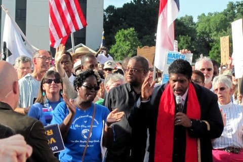 A group of protesters led by Dr. Rev. William Barber II