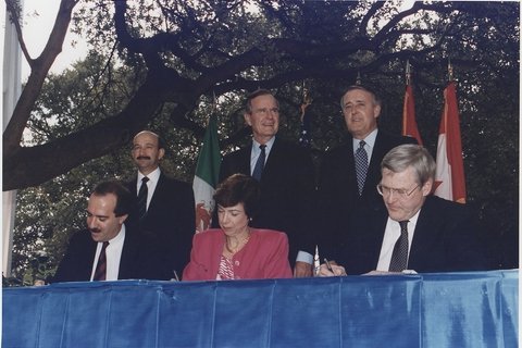 President Bush, Canadian Prime Minister Brian Mulroney and Mexican President Carlos Salinas participate in the initialing ceremony of the North American Free Trade Agreement in San Antonio, Texas.