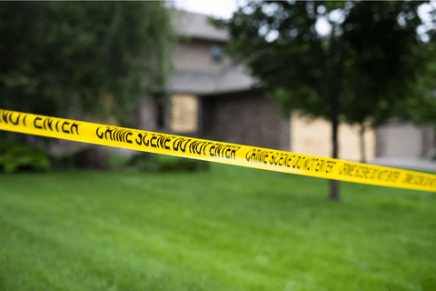 caution tape on the perimeter of a house