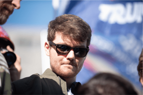 a close up of Nick Fuentes