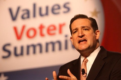 Ted Cruz speaking from a platform.